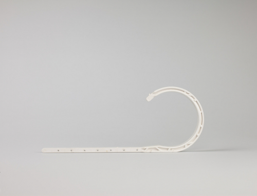 B.0.06 White plastic hook shape