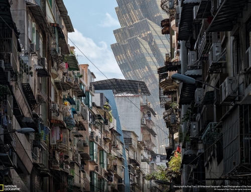 Grand Lisboa Casino looming in the background of a street in Macau