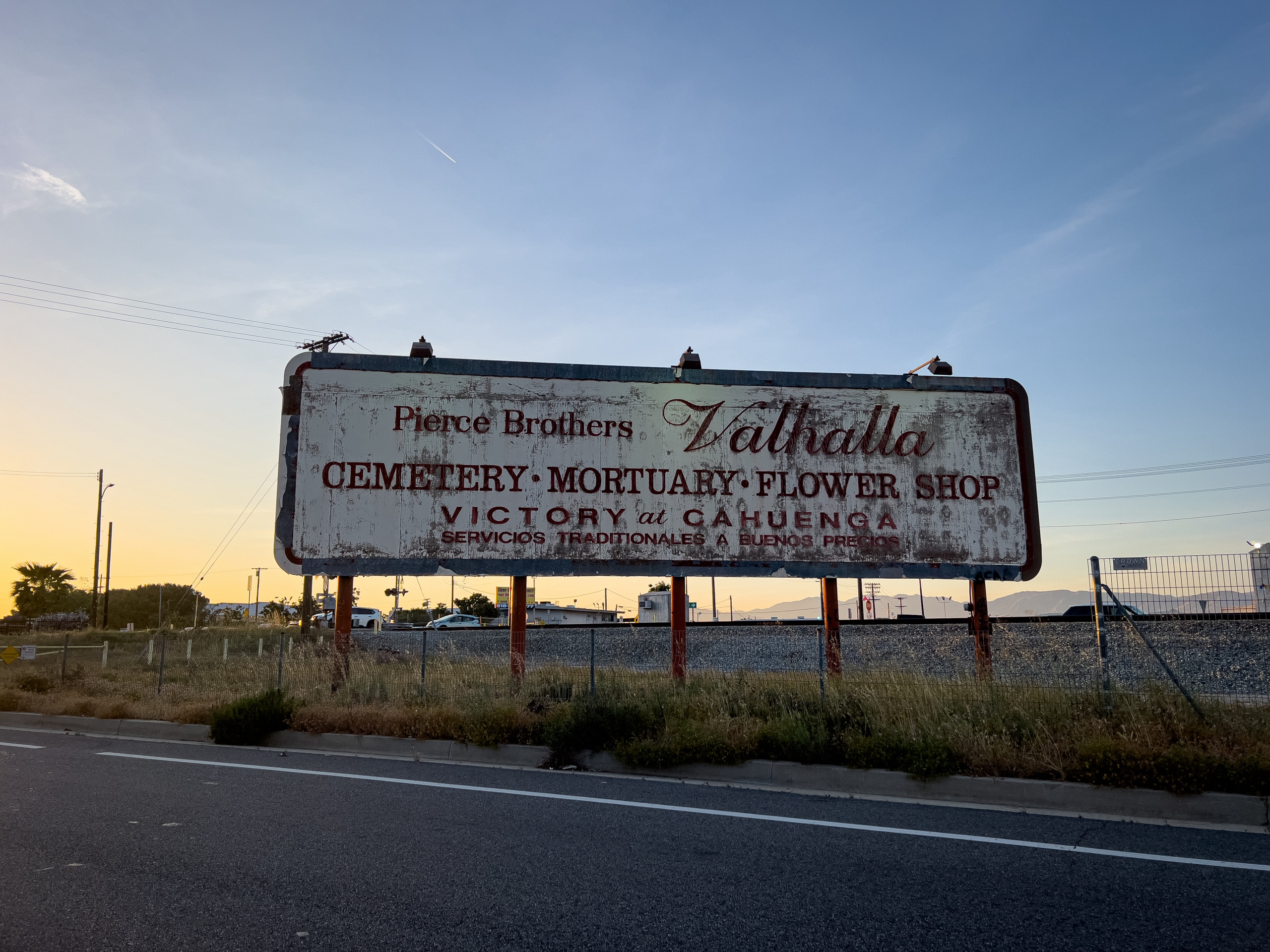 Aged Billboard in Burbank advertising for a Mortuary
