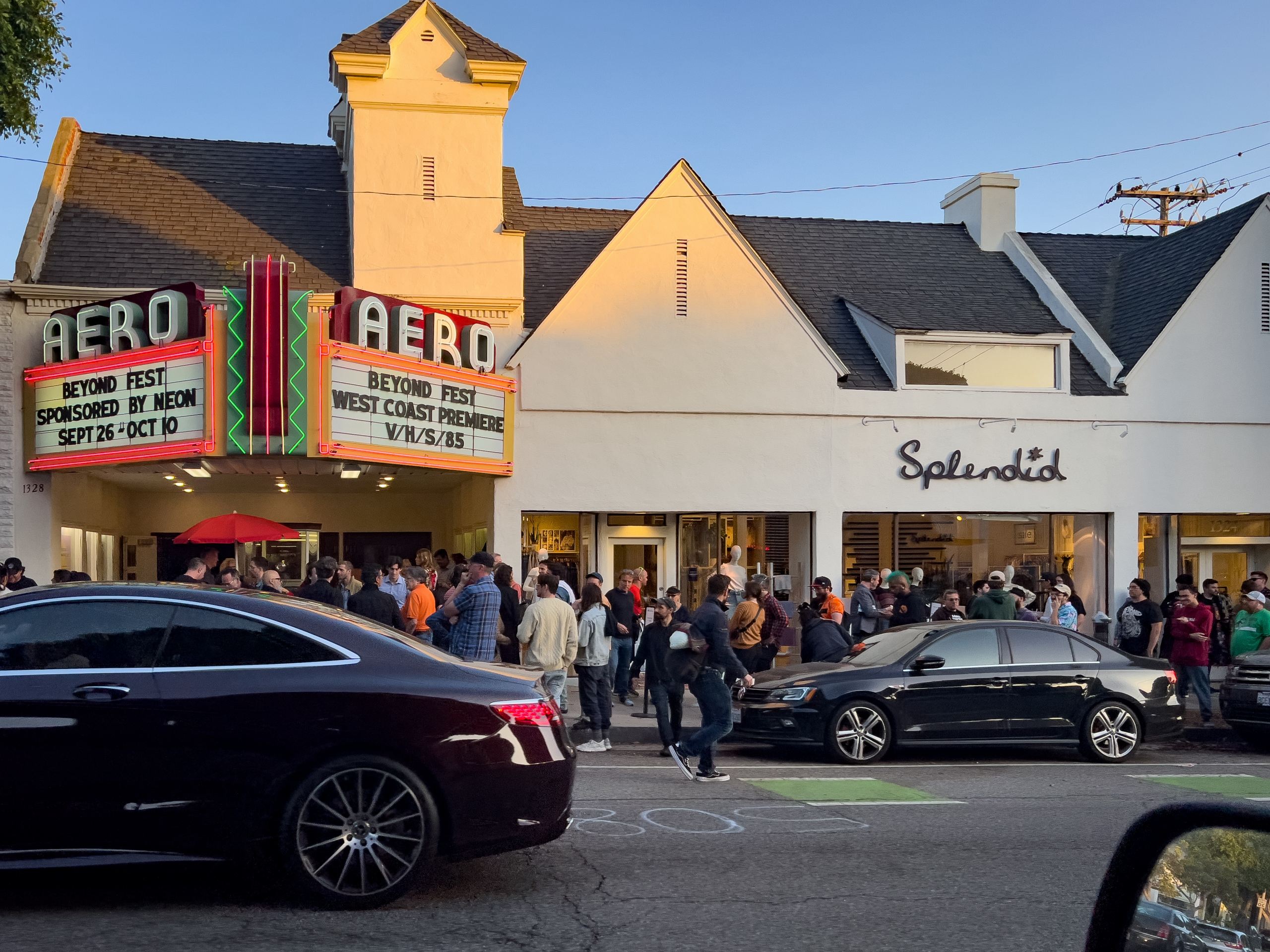 Sunset at the Aero Theater in Santa Monica with a large line of people waiting to see VHS85